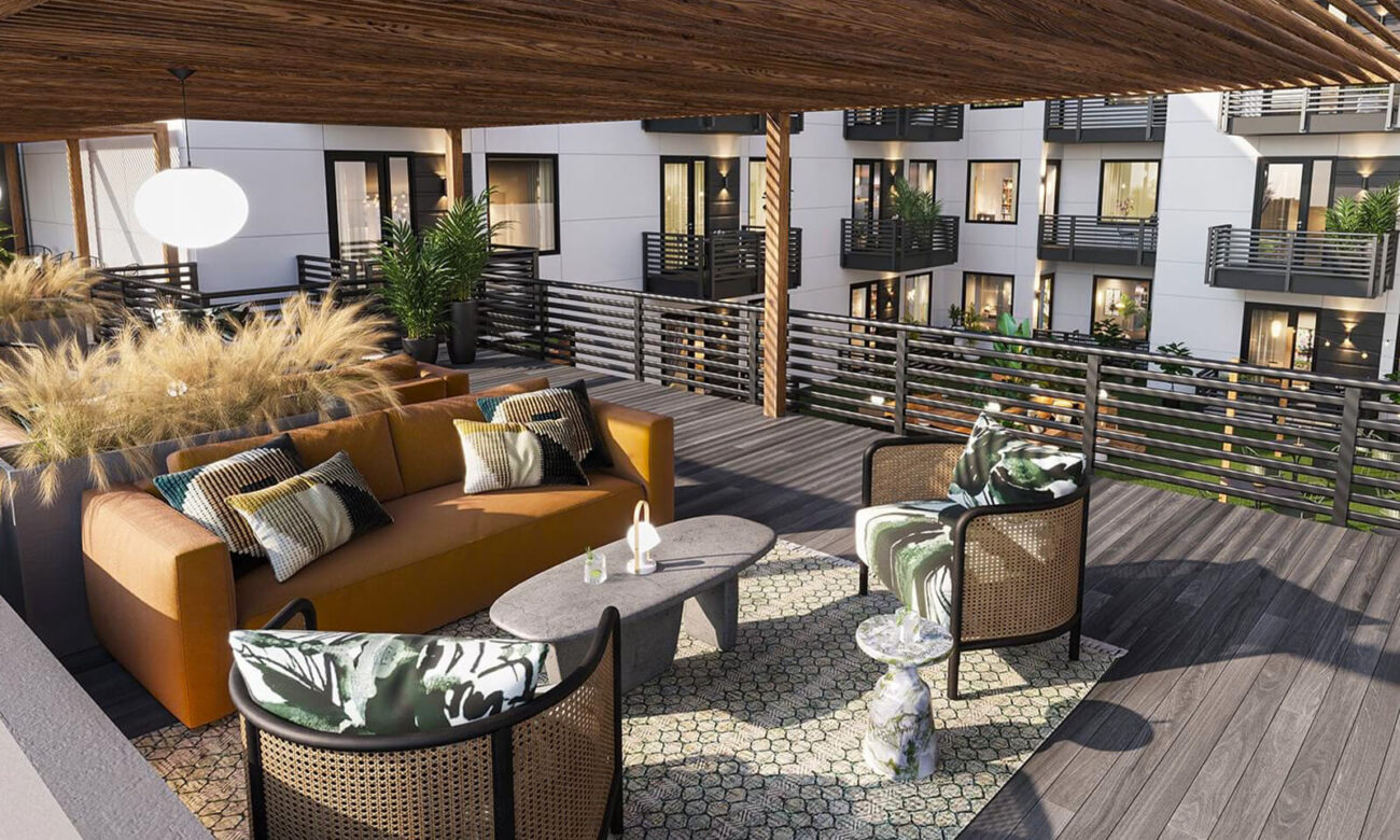 Outdoor area at INK (patio and courtyard), decorated with greens and lots of warm colors.