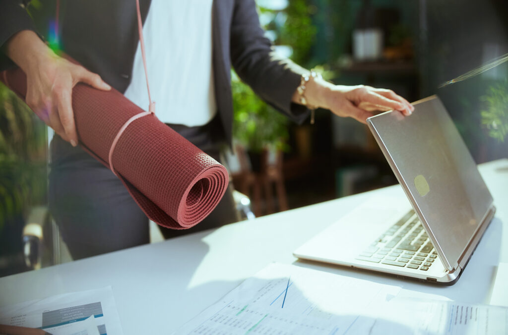 Yoga mat and laptop